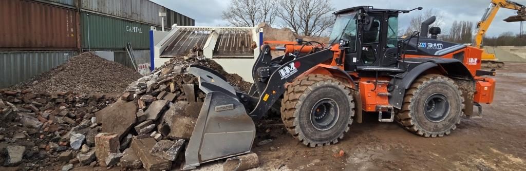 sbr5-bauschutt-hitachi-310-überkorn